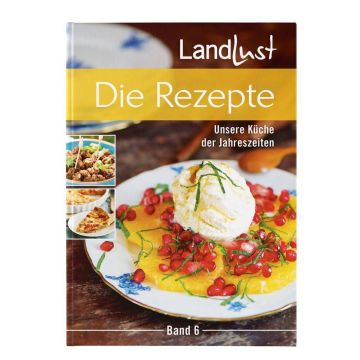 Kochbuch „Landlust Die Rezepte“, Band 6, mit Bildern von zubereiteten Speisen, darunter ein Dessert mit Eis, Granatapfelkernen und Orangenscheiben auf einem weißen Teller